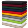 pila tessuti tela sdraio tinta unita colori assortiti nero bordeaux verde blu rosso giallo grigio chiaro grigio medio verde mela bianco beige dettaglio piegato