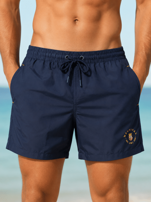 boxer mare uomo nautical blu navy su modello mezzo busto fronte con due tasche laterali dettaglio logo frontale