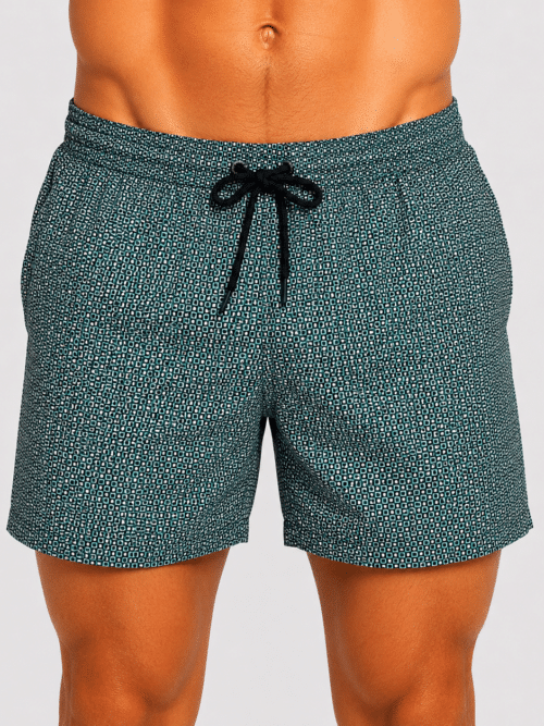 boxer mare uomo scuola nautica italiana verde fantasia quick dry su modello mezzo busto fronte con tasche laterali e rete interna traspirante immagine posteriore